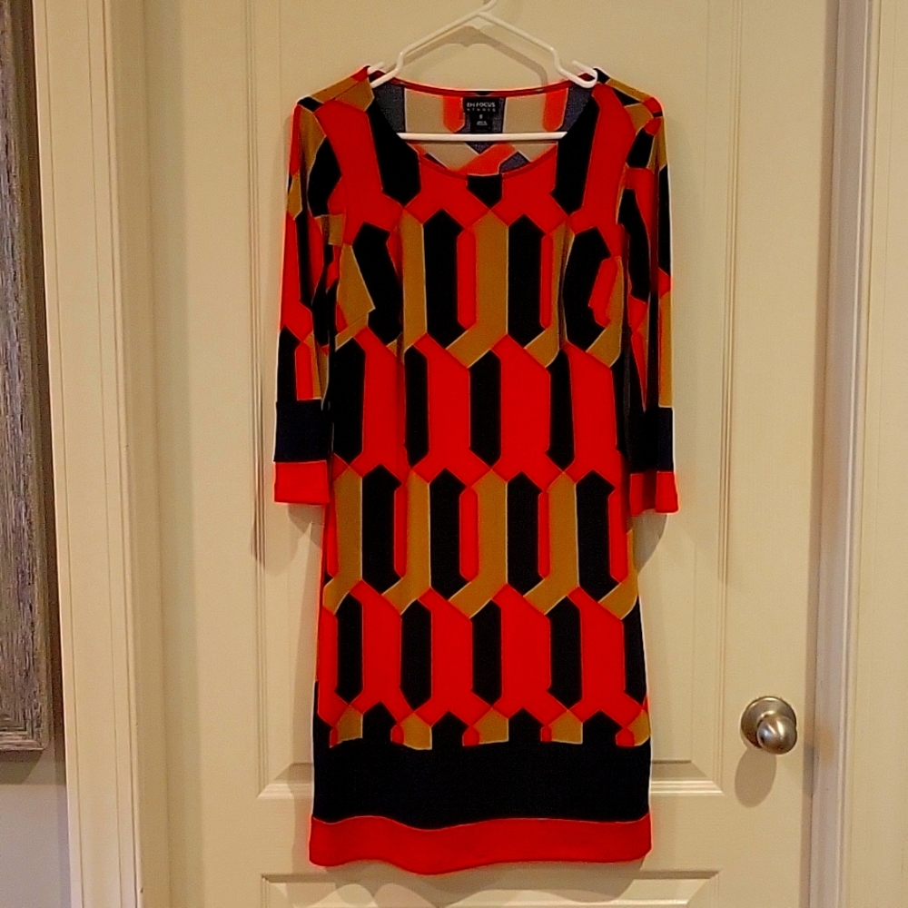 Enfocus Studio orange, navy, tan print stretch rdress. Size 8, EUC